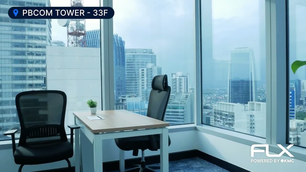 Modern pantry area with sleek cabinets and seating at KMC's office space on the 33rd floor of PBCom Tower, Makati.