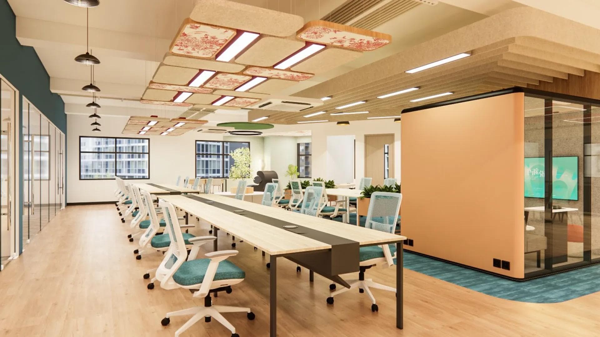 Office in BGC with long desks, ergonomic chairs, wood flooring, acoustic ceiling panels, and glass-walled meeting rooms.